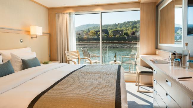 A veranda stateroom offers views of the passing countryside.